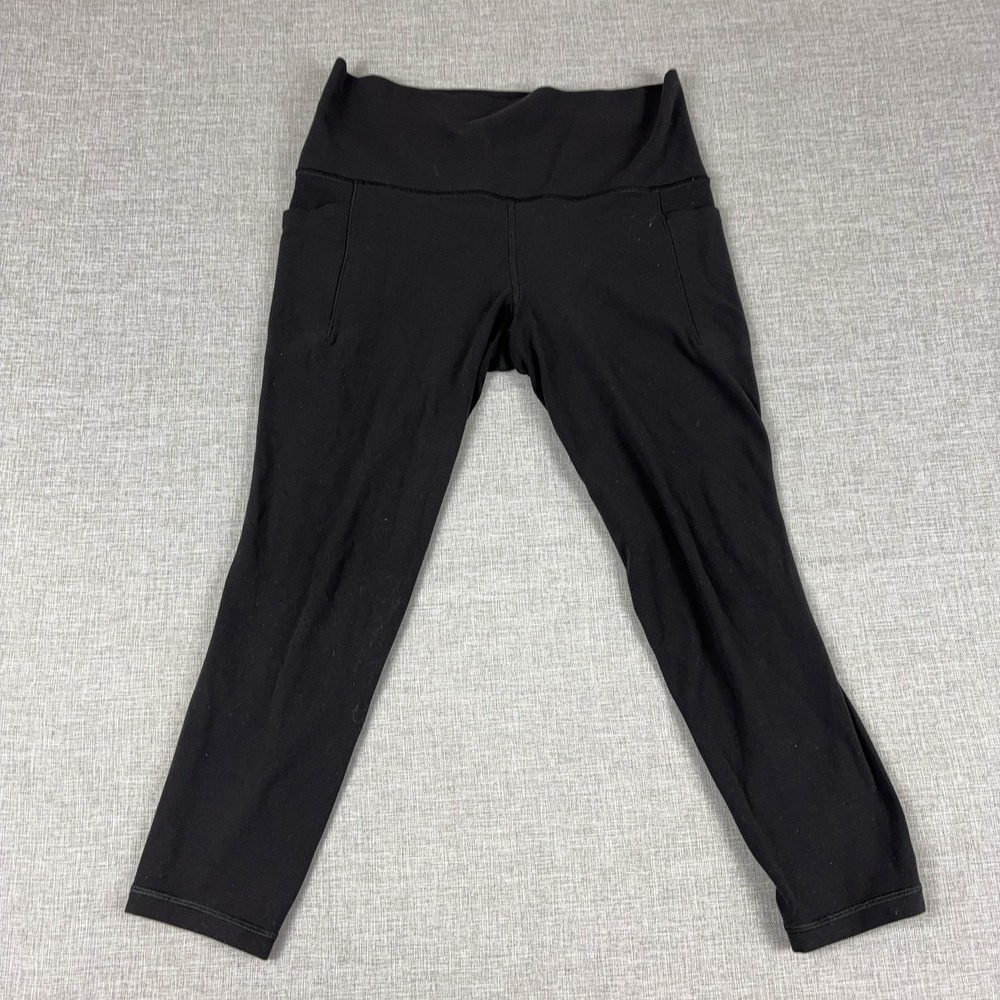 Athleta Leggings Womens M Petite Black Salutation Stash 7/8 Tight Ankle Pockets